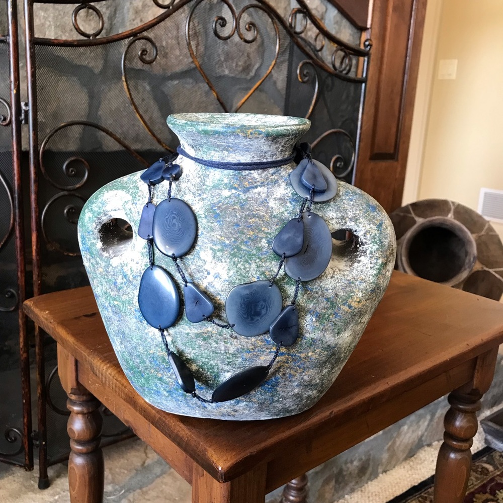 Adjustable satin blue double layer stone. Beautiful to dress up or down.